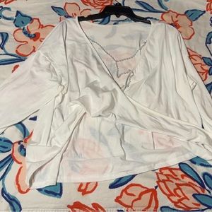 White shirt with pearls on back